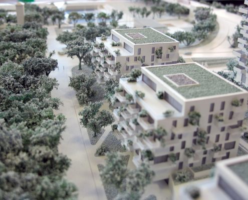 Monochromatický prezentačný model bytových a administratívnych objektov
